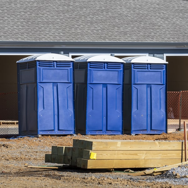 what is the cost difference between standard and deluxe portable restroom rentals in Bellingham Massachusetts